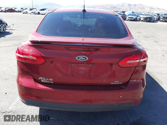 2015 Ford Focus SE z VIN 1FADP3F24FL314108, wystawiony jako Copart lot #57746805 z przebiegiem 64 659 mil mil oraz Szkoda całkowita • Salvage title. Historia ofert i sprzedaży dostępna na DreamBid. Obrazek 6.