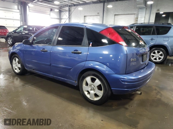 2004 Ford Focus ZX5 with VIN 3FAFP37354R102932, listed as a Copart auction lot 78814004 with 203,087 mi miles and Salvage title. Bid and sale history available at DreamBid. Image 2.