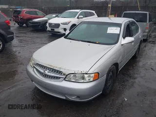 2001 Nissan Altima GXE with VIN 1N4DL01D31C141385, listed as a IAAI auction lot 41827462 with 238,355 mi miles. Bid and sale history available at carsss.com. Image 6.