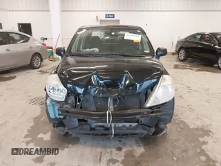 2009 Nissan Versa 1.8 S with VIN 3N1BC11E99L438342, listed as a IAAI auction lot 41561812 with 152,141 mi miles. Bid and sale history available at carsss.com. Image 13.