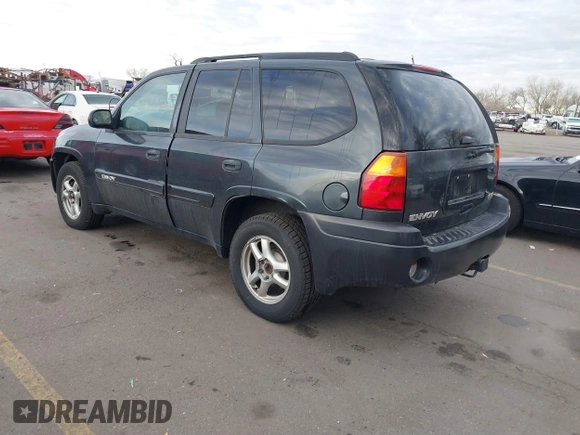2005 GMC Envoy SLT with VIN 1GKDT13S352258833, listed as a IAAI auction lot 41525149 with 213,829 mi miles. Bid and sale history available at carsss.com. Image 3.