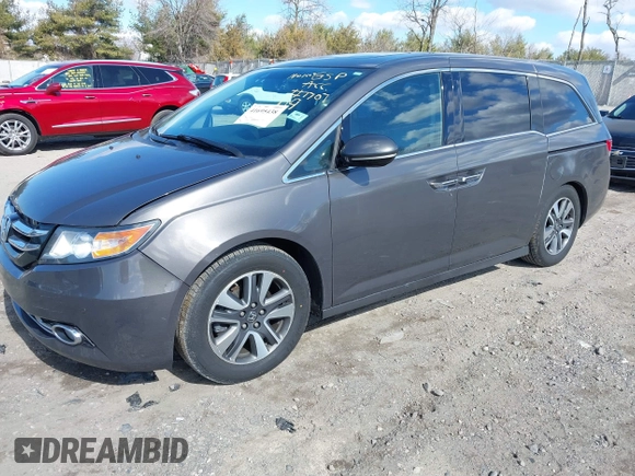 2016 Honda Odyssey Touring Elite with VIN 5FNRL5H90GB128006, listed as a IAAI auction lot 41695438 with 133,337 mi miles. Bid and sale history available at carsss.com. Image 18.