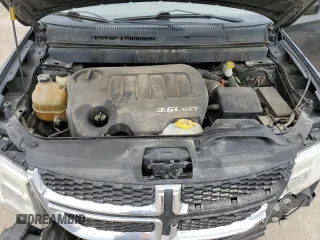 2012 Dodge Journey SXT z VIN 3C4PDCBG2CT314562, wystawiony jako Copart lot #57500195 z przebiegiem 156 319 mil mil oraz Szkoda całkowita • Salvage title. Historia ofert i sprzedaży dostępna na DreamBid. Obrazek 12.