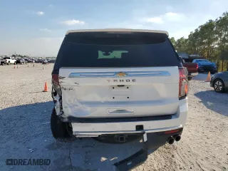 2021 Chevrolet Tahoe High Country with VIN 1GNSCTKL5MR154916, listed as a Copart auction lot 77387254 with 59,469 mi miles and Salvage Title. Bid and sale history available at carsss.com. Image 6.
