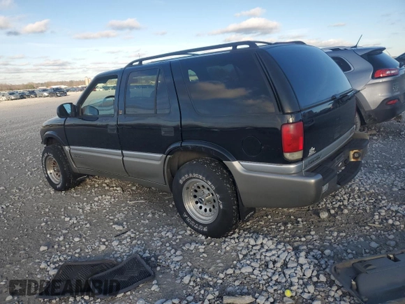 2000 GMC Jimmy SLE Convenience z VIN 1GKDT13W7Y2393191, wystawiony jako Copart lot #82301364 z przebiegiem 160 004 mil mil oraz Czysty tytuł • Clean title. Historia ofert i sprzedaży dostępna na DreamBid. Obrazek 2.