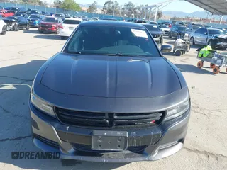 2016 Dodge Charger SXT with VIN 2C3CDXHG6GH327461, listed as a IAAI auction lot 41955412 with 124,775 mi miles and . Bid and sale history available at carsss.com. Image 13.