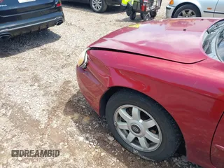2003 Kia Spectra z VIN KNAFB121X35293054, wystawiony jako IAAI lot #42274932 z przebiegiem 108 978 mil mil oraz . Historia ofert i sprzedaży dostępna na DreamBid. Obrazek 12.