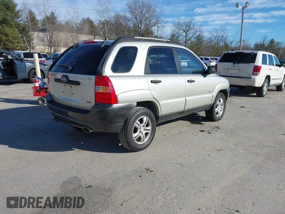 2005 Kia Sportage LX with VIN KNDJE723757081826, listed as a IAAI auction lot 41775450 with 106,992 mi miles and . Bid and sale history available at carsss.com. Image 4.