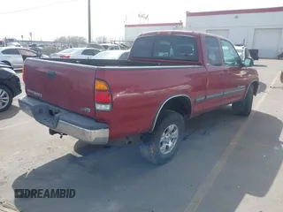 2001 Toyota Tundra SR5 with VIN 5TBRT34171S211237, listed as a IAAI auction lot 41980162 with 390,216 mi miles. Bid and sale history available at carsss.com. Image 4.