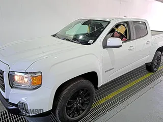2021 GMC Canyon 2WD Elevation z VIN 1GTG5CEN5M1140499, wystawiony jako IAAI lot #42556124 z przebiegiem 41 450 mil mil oraz . Historia ofert i sprzedaży dostępna na DreamBid. Obrazek 18.