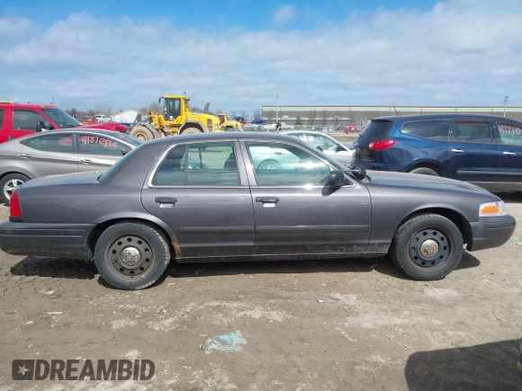 2007 Ford Police Interceptor z VIN 2FAFP71W97X155407, wystawiony jako IAAI lot #41881583 z przebiegiem Nie podano mil oraz . Historia ofert i sprzedaży dostępna na DreamBid. Obrazek 13.