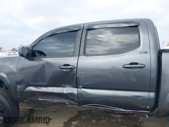 2018 Toyota Tacoma SR5 with VIN 5TFAZ5CNXJX066952, listed as a IAAI auction lot 41894562 with 141,818 mi miles and . Bid and sale history available at DreamBid. Image 14.