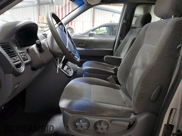 2003 Kia Sedona LX with VIN KNDUP131736467120, listed as a Copart auction lot 61992234 with 133,222 mi miles and Salvage Title. Bid and sale history available at carsss.com. Image 7.