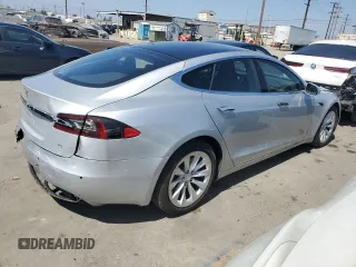 2017 Tesla Model S 60 with VIN 5YJSA1E17HF189627, listed as a Copart auction lot 64454635 with 106,003 mi miles and Salvage title. Bid and sale history available at DreamBid. Image 3.