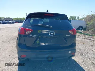 2013 Mazda CX-5 Grand Touring with VIN JM3KE4DE6D0127601, listed as a IAAI auction lot 42143558 with 95,719 mi miles and . Bid and sale history available at DreamBid. Image 16.