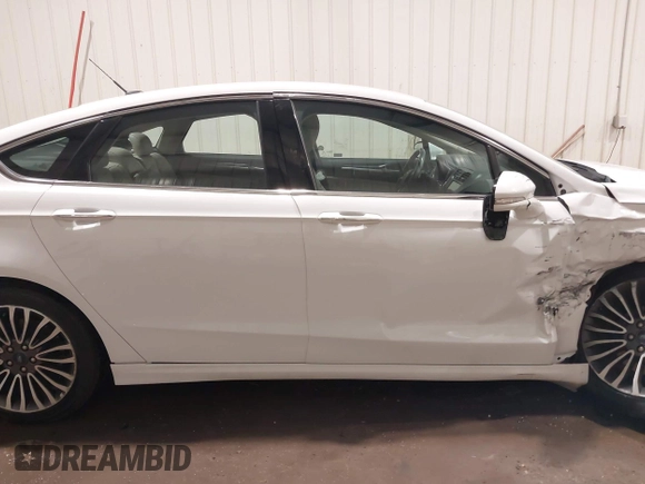 2017 Ford Fusion Titanium with VIN 3FA6P0K98HR124178, listed as a IAAI auction lot 42207938 with 89,352 mi miles and . Bid and sale history available at DreamBid. Image 13.