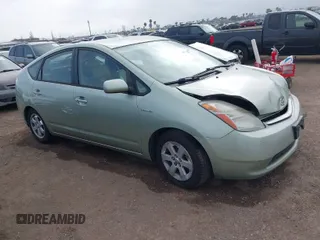 2006 Toyota Prius z VIN JTDKB20U963131145, wystawiony jako IAAI lot #41857847 z przebiegiem 113 251 mil mil oraz . Historia ofert i sprzedaży dostępna na DreamBid. Obrazek 1.