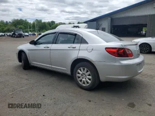 2010 Chrysler Sebring Touring z VIN 1C3CC4FB3AN203543, wystawiony jako Copart lot #57767985 z przebiegiem 152 951 mil mil oraz Szkoda całkowita • Salvage title. Historia ofert i sprzedaży dostępna na DreamBid. Obrazek 2.