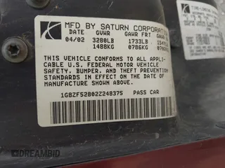 2002 Saturn SL z VIN 1G8ZF52802Z248375, wystawiony jako IAAI lot #42180352 z przebiegiem Nie podano mil oraz . Historia ofert i sprzedaży dostępna na DreamBid. Obrazek 9.
