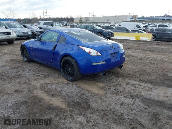 2004 Nissan 350Z Touring with VIN JN1AZ34E04T052916, listed as a IAAI auction lot 41450917 with 157,699 mi miles. Bid and sale history available at carsss.com. Image 3.