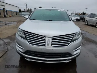 2015 Lincoln MKC z VIN 5LMCJ2A94FUJ10689, wystawiony jako Copart lot #49952045 z przebiegiem 128 040 mil mil oraz Szkoda całkowita • Salvage title. Historia ofert i sprzedaży dostępna na DreamBid. Obrazek 5.