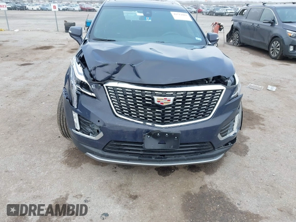 2024 Cadillac XT5 FWD Premium Luxury with VIN 1GYKNCR47RZ755652, listed as a IAAI auction lot 41512069 with 10,243 mi miles. Bid and sale history available at carsss.com. Image 6.