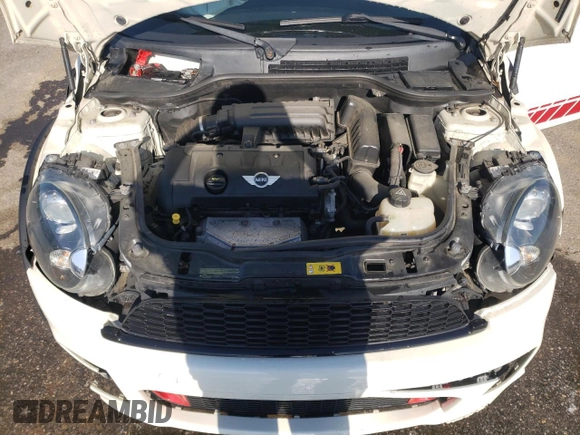 2012 MINI Hardtop with VIN WMWSU3C53CT369974, listed as a Copart auction lot 53238895 with 130,734 mi miles and Salvage Title. Bid and sale history available at DreamBid. Image 12.