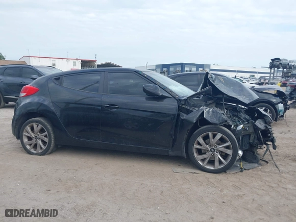 2016 Hyundai Veloster with VIN KMHTC6AD6GU251094, listed as a IAAI auction lot 41971550 with 97,744 mi miles. Bid and sale history available at carsss.com. Image 13.