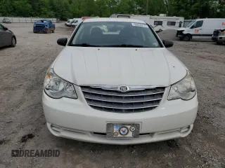 2009 Chrysler Sebring LX z VIN 1C3LC46B19N500211, wystawiony jako Copart lot #56856615 z przebiegiem 66 799 mil mil oraz Szkoda całkowita • Salvage title. Historia ofert i sprzedaży dostępna na DreamBid. Obrazek 5.