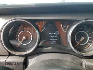 2023 Jeep Gladiator Sport S с VIN 1C6HJTAG8PL534103, выставлен на аукционе Copart как лот 63114795 с пробегом 42 054 миль миль и Списание • Salvage title. История ставок и продаж доступна на DreamBid. Изображение 9.