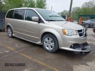 2013 Dodge Grand Caravan Crew with VIN 2C4RDGDG7DR624563, listed as a IAAI auction lot 42038157 with 265,044 mi miles and . Bid and sale history available at DreamBid. Image 1.