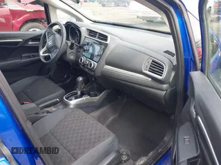 2015 Honda Fit LX with VIN 3HGGK5H52FM710434, listed as a IAAI auction lot 42022022 with 104,118 mi miles. Bid and sale history available at carsss.com. Image 5.