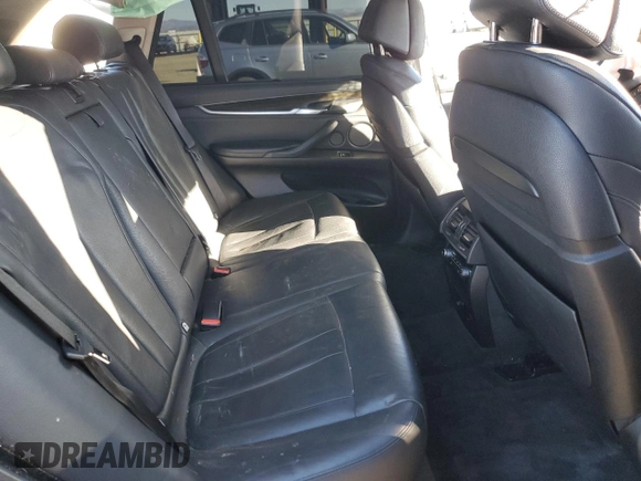 2014 BMW X5 xDrive35i z VIN 5UXKR0C59E0K51868, wystawiony jako Copart lot #79139994 z przebiegiem Nie podano mil oraz Szkoda całkowita • Salvage title. Historia ofert i sprzedaży dostępna na DreamBid. Obrazek 11.