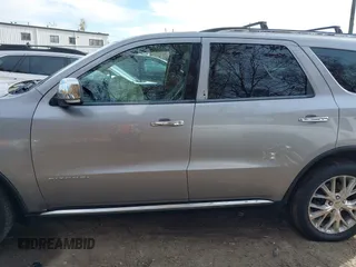 2014 Dodge Durango Citadel z VIN 1C4SDJET5EC509366, wystawiony jako IAAI lot #40735205 z przebiegiem 149 644 mil mil oraz . Historia ofert i sprzedaży dostępna na DreamBid. Obrazek 13.