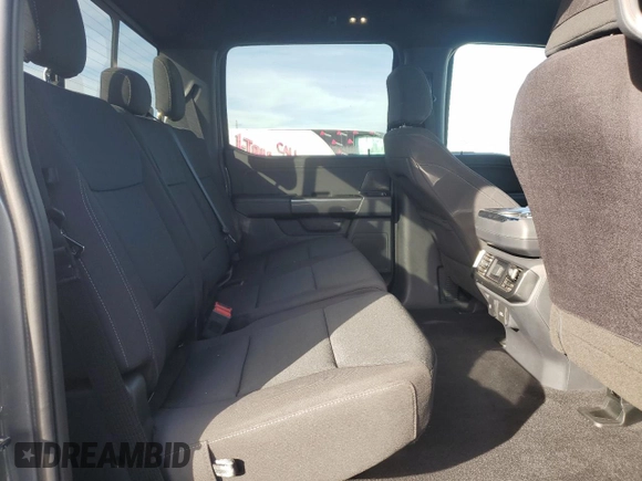 2023 Ford F-150 XL with VIN 1FTEW1EP4PFB38678, listed as a Copart auction lot 43024045 with 8,718 mi miles and Salvage title. Bid and sale history available at DreamBid. Image 10.