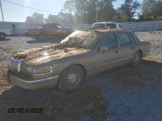 1996 Lincoln Town Car Signature z VIN 1LNLM82W7TY720205, wystawiony jako Copart lot #75286354 z przebiegiem Nie podano mil oraz Nie do naprawy • Non repairable. Historia ofert i sprzedaży dostępna na DreamBid. Obrazek 1.
