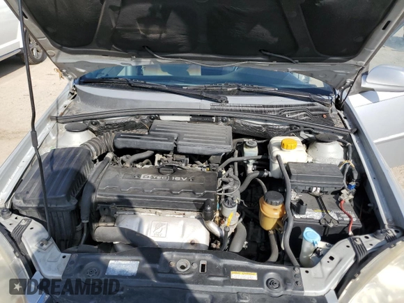 2006 Suzuki Forenza z VIN KL5JD56Z66K299816, wystawiony jako Copart lot #81893914 z przebiegiem 156 416 mil mil oraz Szkoda całkowita • Salvage title. Historia ofert i sprzedaży dostępna na DreamBid. Obrazek 11.