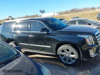 2015 Cadillac Escalade Premium with VIN 1GYS4CKJ0FR180180, listed as a IAAI auction lot 41054933 with 146,974 mi miles. Bid and sale history available at carsss.com. Image 13.