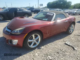 2009 Saturn Sky Red Line z VIN 1G8MF35XX9Y100011, wystawiony jako Copart lot #57884065 z przebiegiem 104 714 mil mil oraz Szkoda całkowita • Salvage title. Historia ofert i sprzedaży dostępna na DreamBid. Obrazek 1.