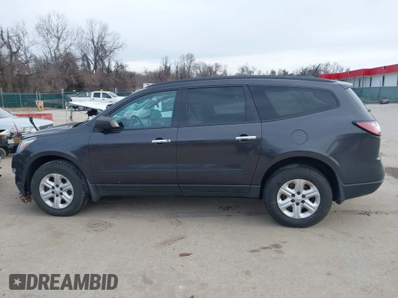 2017 Chevrolet Traverse LS z VIN 1GNKVFKD4HJ142765, wystawiony jako IAAI lot #41630040 z przebiegiem 82 986 mil mil oraz . Historia ofert i sprzedaży dostępna na DreamBid. Obrazek 14.