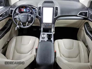 2021 Ford Edge Titanium с VIN 2FMPK4K94MBA27083, выставлен на аукционе Copart как лот 62149285 с пробегом 128 325 миль миль и Чистый • Clean title. История ставок и продаж доступна на DreamBid. Изображение 8.