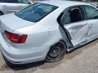 2017 Volkswagen Jetta S z VIN 3VW2B7AJ8HM242804, wystawiony jako IAAI lot #42595566 z przebiegiem 96 551 mil mil oraz . Historia ofert i sprzedaży dostępna na DreamBid. Obrazek 18.