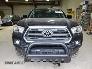 2017 Toyota Tacoma SR5 with VIN 5TFCZ5AN8HX067720, listed as a Copart auction lot 84801184 with 76,148 mi miles and Salvage title. Bid and sale history available at DreamBid. Image 5.