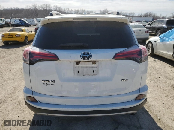 2018 Toyota RAV4 XLE with VIN JTMWFREV0JJ730682, listed as a Copart auction lot 46587675 with 38,526 mi miles and Salvage Title. Bid and sale history available at carsss.com. Image 6.