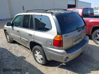 2003 GMC Envoy SLT with VIN 1GKDS13S932106295, listed as a IAAI auction lot 41594814 with 199,597 mi miles. Bid and sale history available at carsss.com. Image 3.