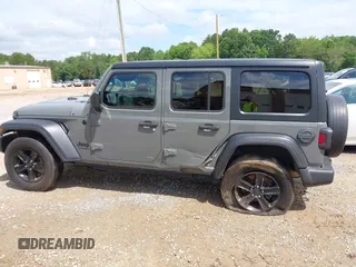 2020 Jeep Wrangler Unlimited Freedom with VIN 1C4HJXDG2LW186027, listed as a IAAI auction lot 42449664 with 87,869 mi miles and . Bid and sale history available at DreamBid. Image 14.