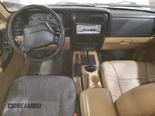 1998 Jeep Cherokee Sport with VIN 1J4FJ68S2WL239891, listed as a Copart auction lot 62966025 with 128,226 mi miles and Clean title. Bid and sale history available at DreamBid. Image 8.