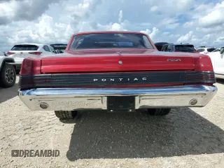 1965 Pontiac GTO z VIN 233275P156710, wystawiony jako Copart lot #74094594 z przebiegiem 22 008 mil mil oraz Szkoda całkowita • Salvage title. Historia ofert i sprzedaży dostępna na DreamBid. Obrazek 6.