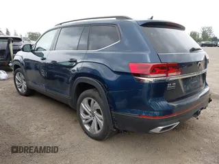2021 Volkswagen Atlas SE z VIN 1V2WR2CA7MC568779, wystawiony jako IAAI lot #42132709 z przebiegiem 51 205 mil mil oraz . Historia ofert i sprzedaży dostępna na DreamBid. Obrazek 3.