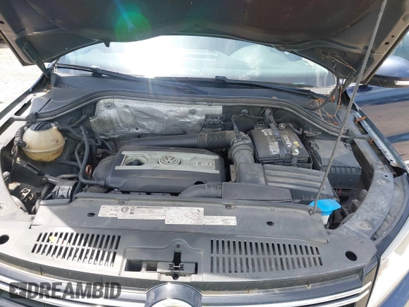 2012 Volkswagen Tiguan SEL with VIN WVGAV7AX7CW608637, listed as a IAAI auction lot 42173987 with 149,013 mi miles and . Bid and sale history available at DreamBid. Image 10.